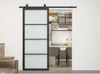 Puertas tipo loft con marco de hierro negro, puerta corrediza de granero de vidrio esmerilado de acero al carbono