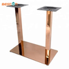Base de mesa con patas de muebles de metal construido en oro rosa con base rectangular