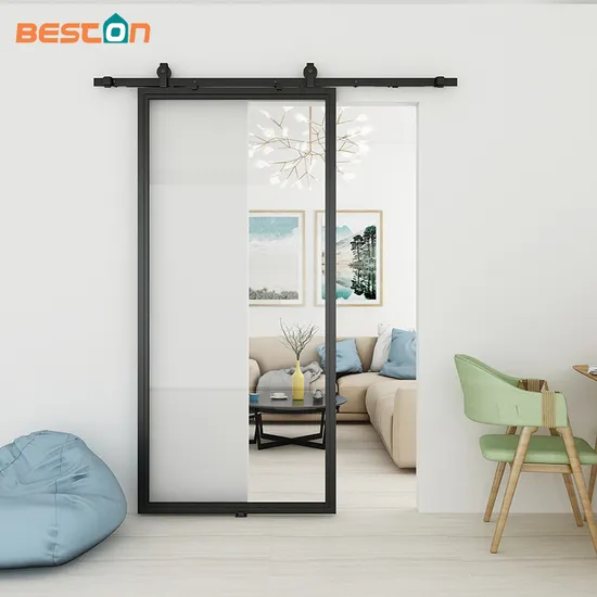 Puerta de una pieza con marco de acero negro y metal con inserto de vidrio transparente