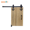 Sistema de riel para puerta de granero de acero al carbono negro de 6,6 pies para puertas interiores de madera – Rodillos resistentes para hogares modernos y rústicos