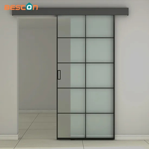 Puertas corredizas de granero de hierro y vidrio personalizadas con herrajes